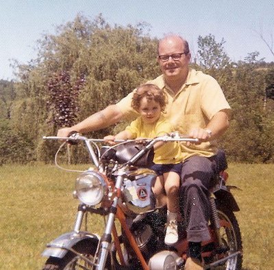 This is when the bike was new. My Dad bought two. That is me getting a ride in approximately 1973.