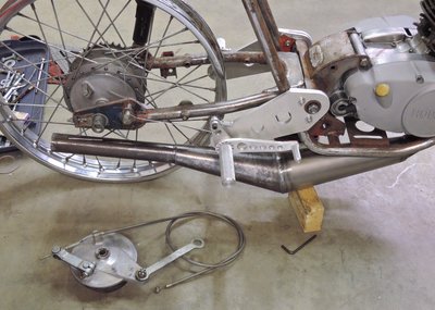 Rear brake linkage puzzle