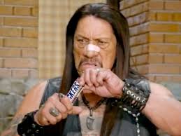 Freddie eating his Snickers bar